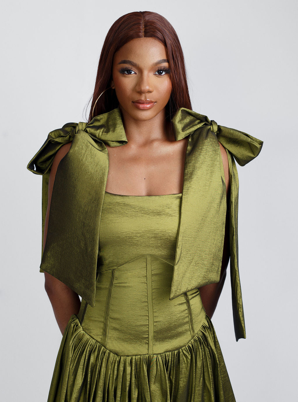 Fashion-forward olive green mini bow-strap dress with elegant shoulder bows and a playful above-the-knee fit. Perfect for summer parties, brunch dates, and special occasions. Shop trendy women’s dresses, chic summer outfits, and 2025 fashion must-haves at Kaiiko and Virgo. Wedding Guest dress ideas