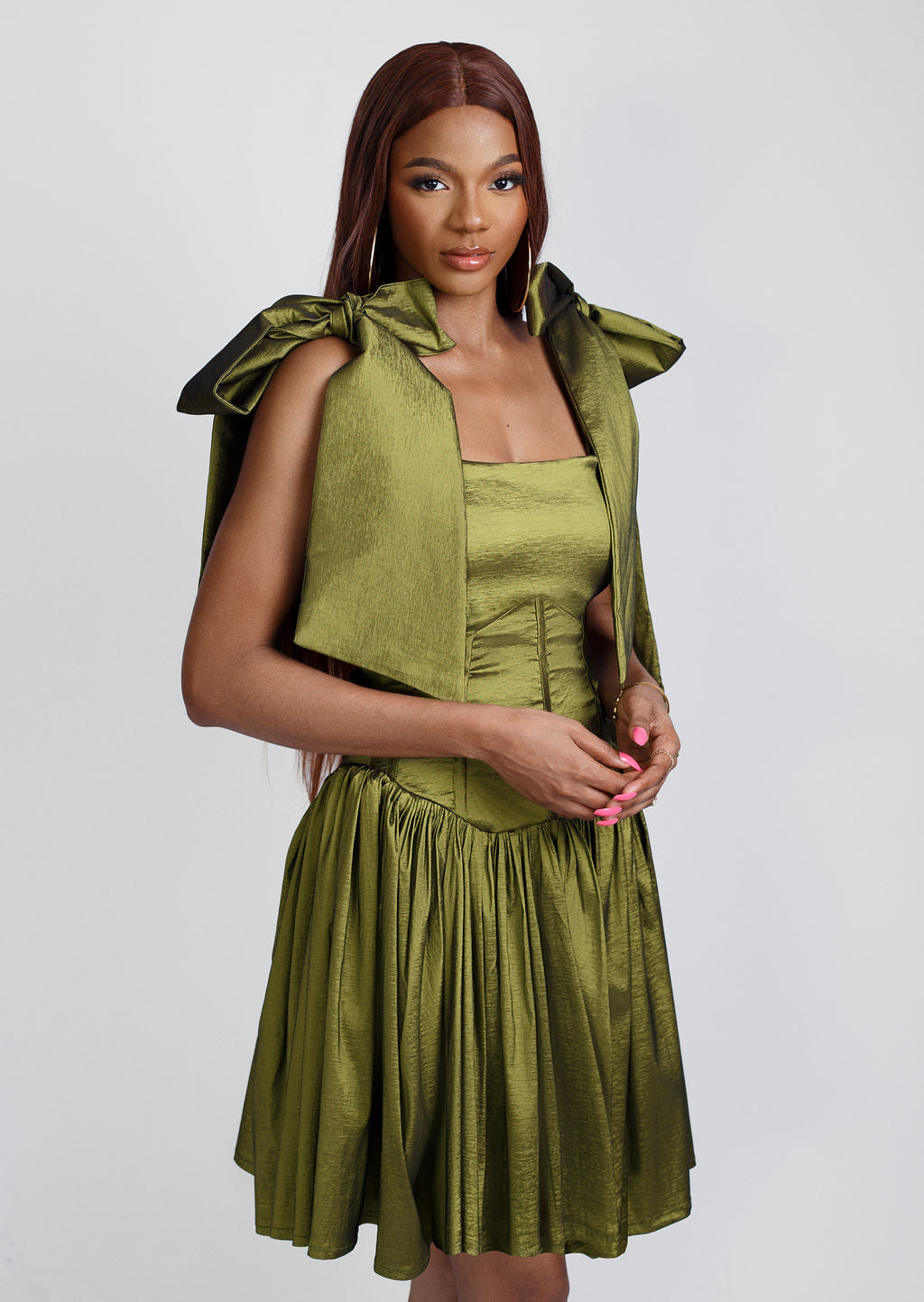 Fashion-forward green mini bow-strap dress with elegant shoulder bows and a playful above-the-knee fit. Perfect for summer parties, brunch dates, and special occasions. Shop trendy women’s dresses, chic summer outfits, and 2025 fashion must-haves at Kaiiko and Virgo.