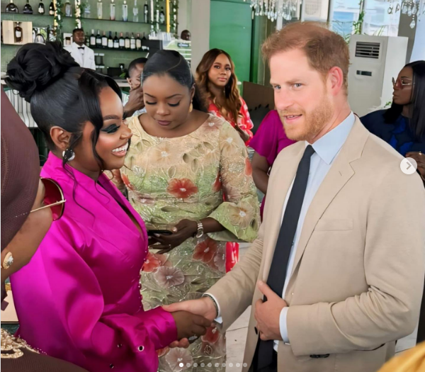 Ghanian Actress Jackie Appiah exchanging a Handshake with Prince Harry Who is the Duke of Sussex.